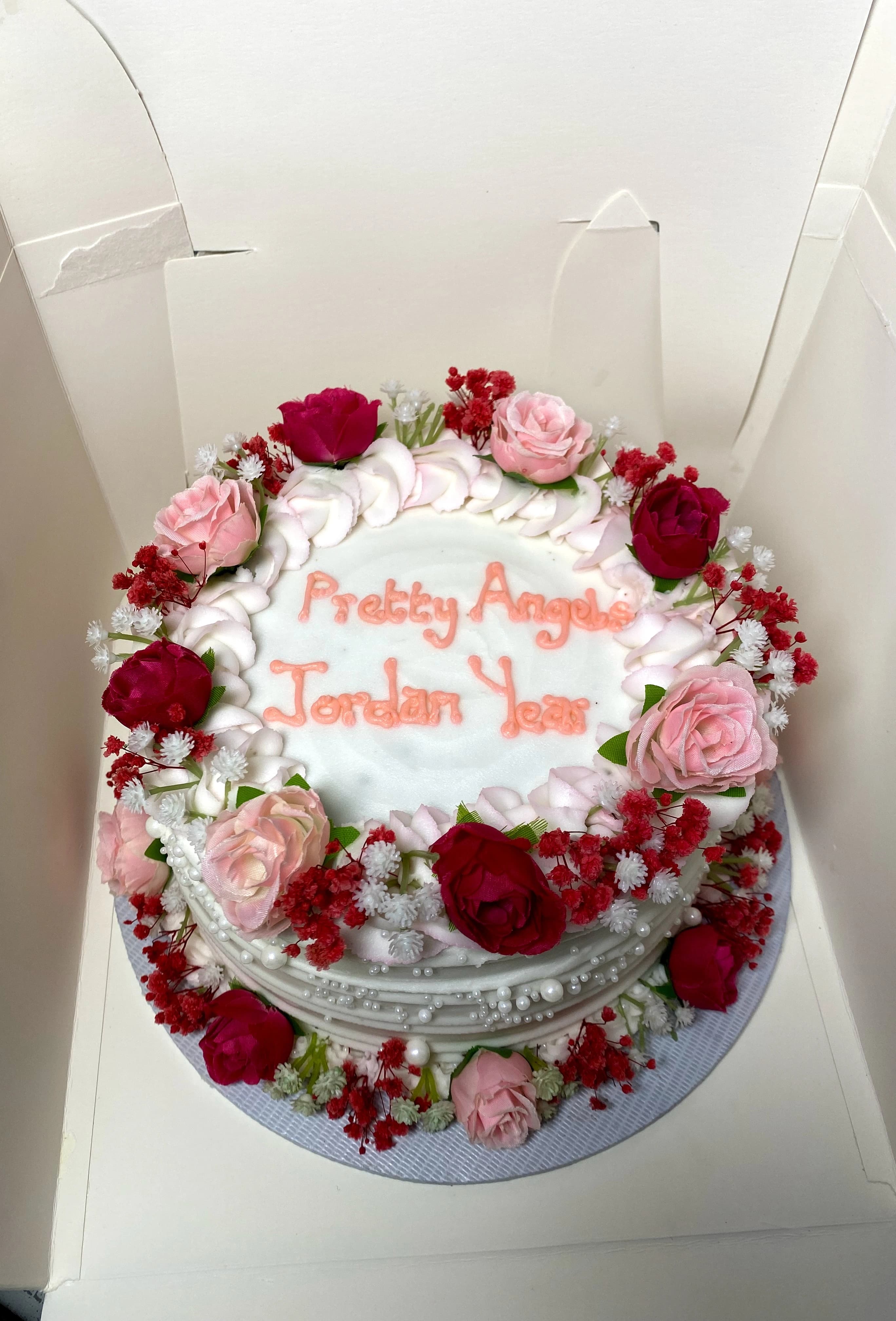 Elegant layered cake with buttercream frosting